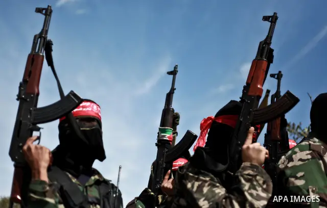Palestinian militants of the Democratic Front for the Liberation of Palestine (DFLP) take part in a training exercise in front of the media in Rafah in the southern Gaza Strip, Mar. 08, 2012. Photo by Ali Jadallah