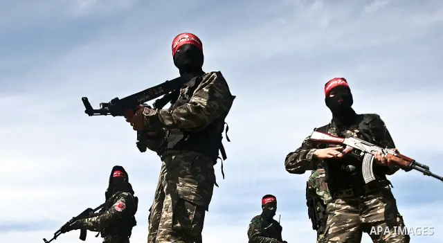 Palestinian militants of the Democratic Front for the Liberation of Palestine (DFLP) take part in a training exercise in front of the media in Rafah in the southern Gaza Strip, Mar. 08, 2012. Photo by Ali Jadallah