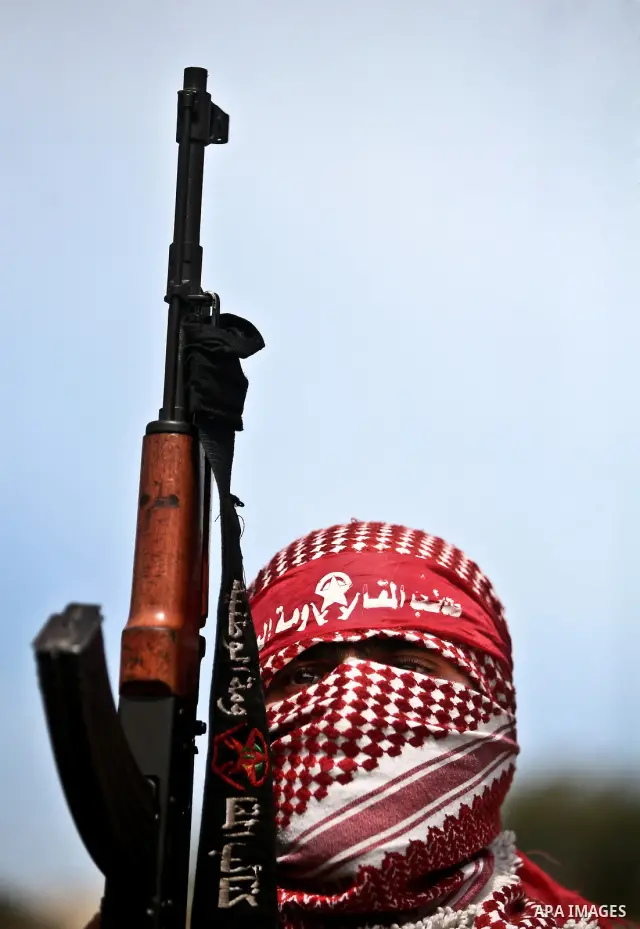 Palestinian militants of the Democratic Front for the Liberation of Palestine (DFLP) take part in a training exercise in front of the media in Rafah in the southern Gaza Strip, Mar. 08, 2012. Photo by Ali Jadallah