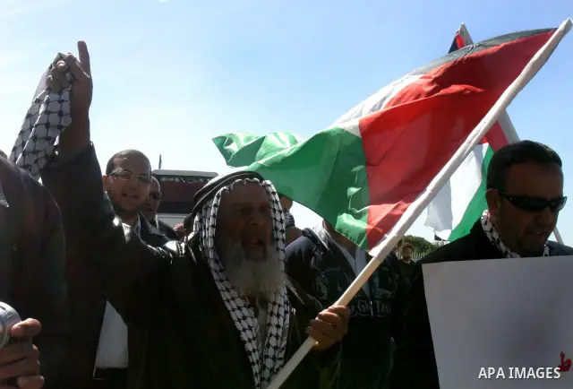 Palestinian protesters demonstrate near the Dome of the Rock in the Al-Aqsa mosque compound against a decision by the Jerusalem municipality and Israel's Nature and Parks Authority (NPA) to build a national park on Pales...