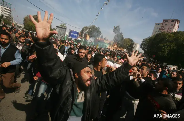 Palestinian mourners carry the bodies of seven Islamic Jihad militants (not all seen in picture), who were killed in Israeli air strikes, during their funeral in Gaza City on March 10, 2012. Twelve Palestinian fighters w...