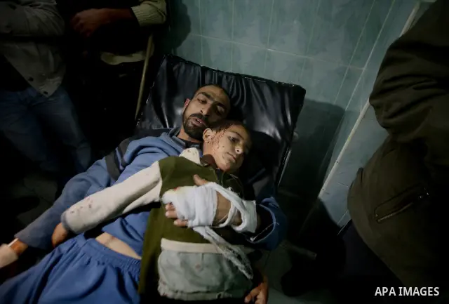 Wounded Palestinian children receive medical atttention at a hospital in Beit Lahia in the northern Gaza Strip on March 12, 2012, following an Israeli air raid. Israeli war planes carried out new air strikes on Gaza over...