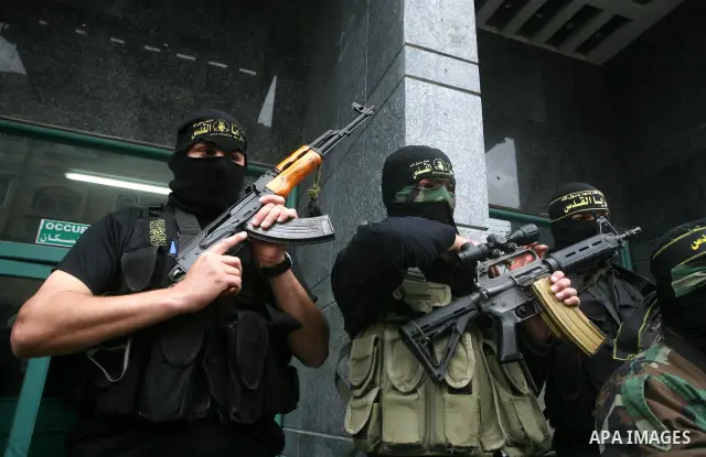Islamic Jihad militants hold a news conference in Gaza City March 12, 2012. Israeli air strikes killed two Palestinian militants and a civilian in the Gaza Strip on Monday in a fourth day of cross-border hostilities, med...