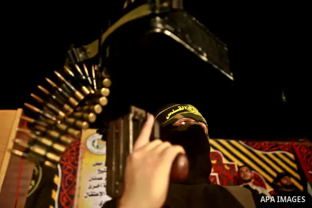 A Palestinian Islamic Jihad militant is seen in Gaza City on 13 March 2012. A fragile truce appeared to be taking hold Tuesday between Israel and Palestinian militias in the Gaza Strip, ending four days of fierce tit-for...