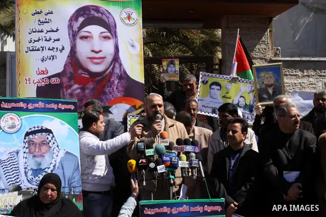 Palestinian deputy in the Legislative Council, delivers speech during a press conference weekly protest calling for release the prisoners ,in Gaza City on March 19, 2012. Photo by Mohammed Asad