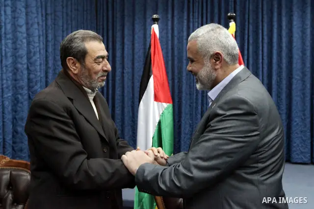 Palestinian Prime Minister in Gaza Strip, Ismail Haniyeh, receives, delegation of the General Command in his office in Gaza City, on Mar. 19, 2012. Photo by Ahmed Shaat