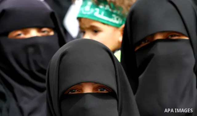 Palestinian women take part in a Hamas rally calling on Egyptian authorities to provide the Gaza Strip with electricity and fuel near the Rafah Border crossing, in the southern Gaza Strip, 20 March 2012. Gazans are repor...