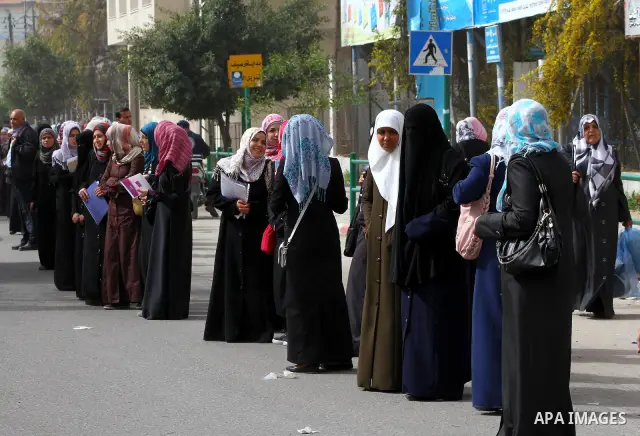 palestinians students wait a taxis in the street after the fuel shortage in Gaza Strip on 20 march 2012. Gaza's top political leader blamed Egypt earlier this month for causing a power crisis that has triggered lengthy b...