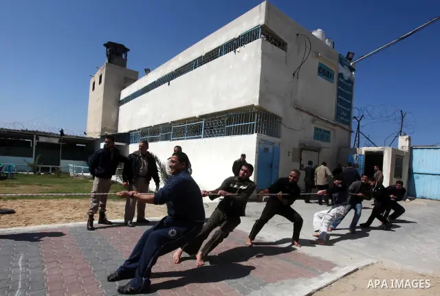 Palestinian prisoners enjoy in a Hamas-run jail during "entertainment Day" by Supervision of the Red Cross in Gaza City on Mar. 22, 2012. Photo by Ashraf Amra