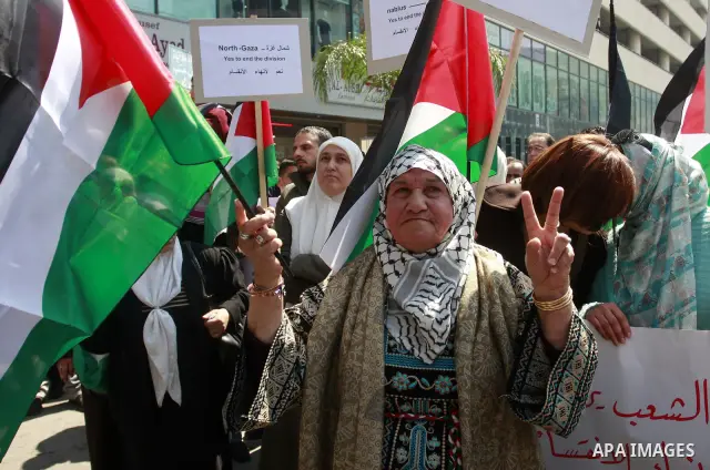 Demonstrators from the Palestinian factions participating in demonstration to end the division and are demanding a national unity in the West Bank city of Nablus, Mar. 22, 2012 .Photo by Wagdi Eshtayah