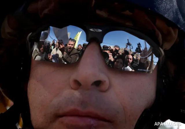 Palestinian demonstrators during a protest supporting Palestinian prisoner Hana Shalabi, outside Ofer prison near the West Bank city of Ramallah March 22, 2012. The deteriorating health of Shalabi, the Palestinian prison...