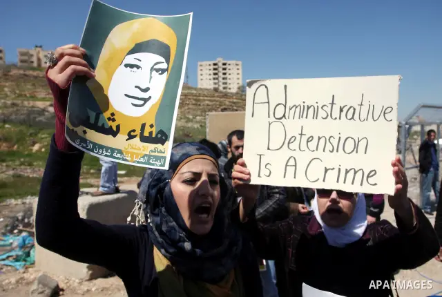 Palestinian demonstrators during a protest supporting Palestinian prisoner Hana Shalabi, outside Ofer prison near the West Bank city of Ramallah March 22, 2012. The deteriorating health of Shalabi, the Palestinian prison...