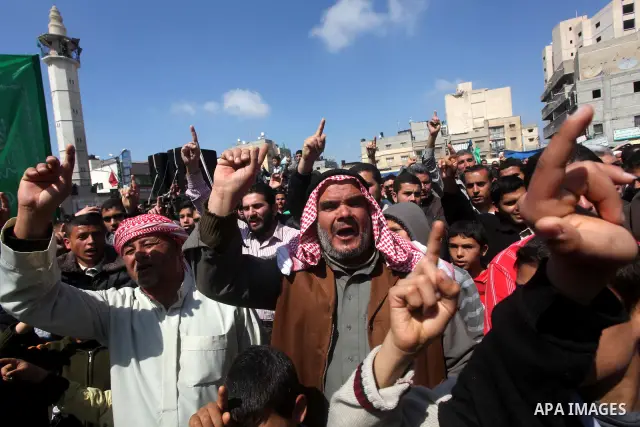Palestinians take part in a rally calling on Egyptian authorities to supply the Gaza Strip with fuel and electricity in Khan Younis on the southern Gaza Strip March 23, 2012. Israel allowed nine fuel tankers to cross int...