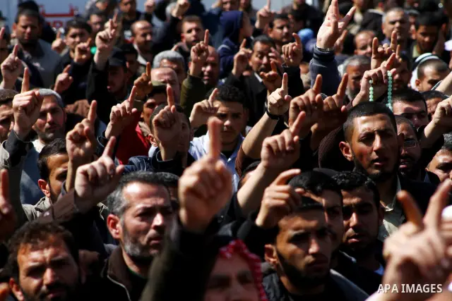 Palestinians take part in a rally calling on Egyptian authorities to supply the Gaza Strip with fuel and electricity in Khan Younis on the southern Gaza Strip March 23, 2012. Israel allowed nine fuel tankers to cross int...