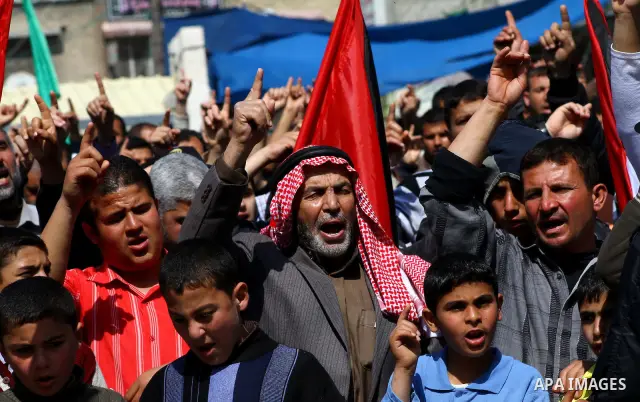 Palestinians take part in a rally calling on Egyptian authorities to supply the Gaza Strip with fuel and electricity in Khan Younis on the southern Gaza Strip March 23, 2012. Israel allowed nine fuel tankers to cross int...