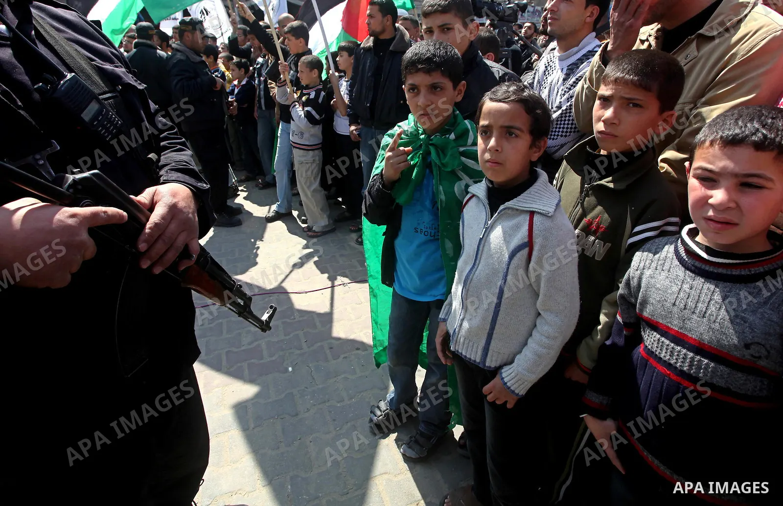 Palestinians take part in a rally calling on Egyptian authorities to supply the Gaza Strip with fuel and electricity in Khan Younis on the southern Gaza Strip March 23, 2012. Israel allowed nine fuel tankers to cross int...