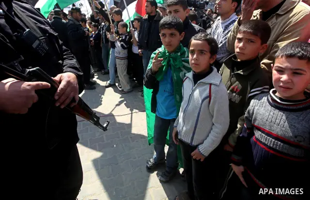 Palestinians take part in a rally calling on Egyptian authorities to supply the Gaza Strip with fuel and electricity in Khan Younis on the southern Gaza Strip March 23, 2012. Israel allowed nine fuel tankers to cross int...