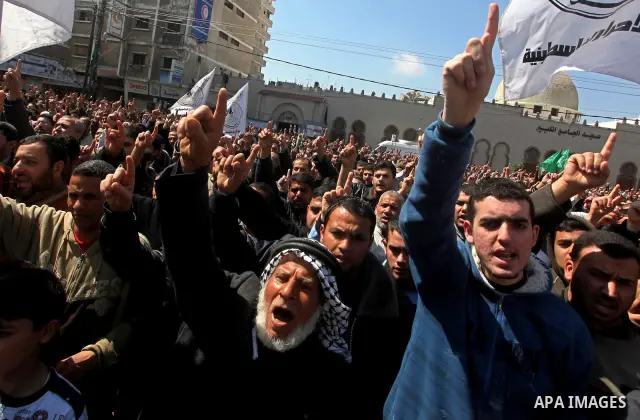 Palestinians take part in a rally calling on Egyptian authorities to supply the Gaza Strip with fuel and electricity in Khan Younis on the southern Gaza Strip March 23, 2012. Israel allowed nine fuel tankers to cross int...