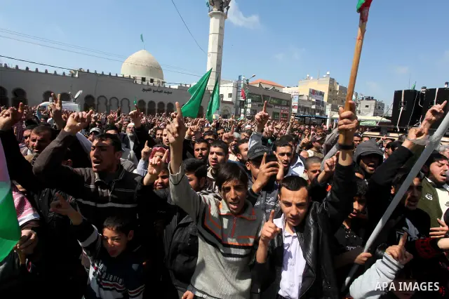 Palestinians take part in a rally calling on Egyptian authorities to supply the Gaza Strip with fuel and electricity in Khan Younis on the southern Gaza Strip March 23, 2012. Israel allowed nine fuel tankers to cross int...