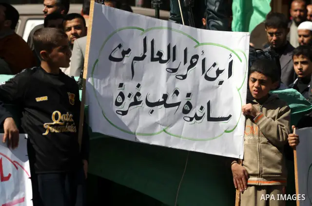 Palestinians take part in a rally calling on Egyptian authorities to supply the Gaza Strip with fuel and electricity in Gaza City March 23, 2012. Israel allowed nine fuel tankers to cross into the Gaza Strip on Friday to...