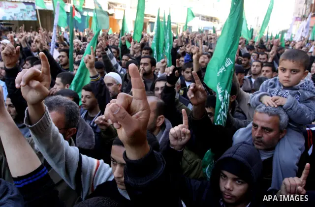 Palestinians take part in a rally calling on Egyptian authorities to supply the Gaza Strip with fuel and electricity in Gaza City March 23, 2012. Israel allowed nine fuel tankers to cross into the Gaza Strip on Friday to...