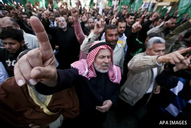 Palestinians take part in a rally calling on Egyptian authorities to supply the Gaza Strip with fuel and electricity in Gaza City March 23, 2012. Israel allowed nine fuel tankers to cross into the Gaza Strip on Friday to...