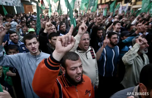 Palestinians take part in a rally calling on Egyptian authorities to supply the Gaza Strip with fuel and electricity in Gaza City March 23, 2012. Israel allowed nine fuel tankers to cross into the Gaza Strip on Friday to...