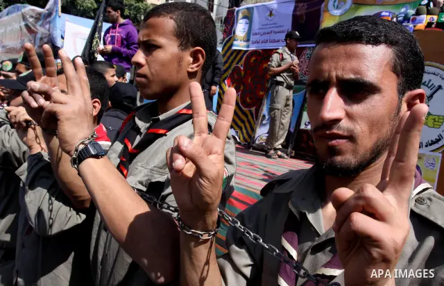 Palestinian Islamic Jihad supporters take part in a rally in support of Hana Shalabi and calling for the release of Palestinian prisoners held in Israeli jails, in Gaza City March 23, 2012. The deteriorating health of Sh...