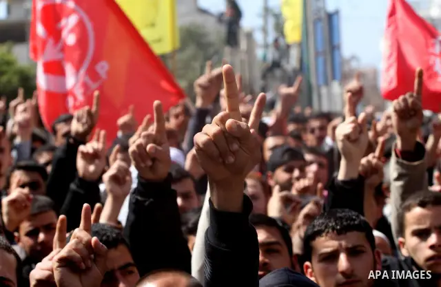 Palestinian Islamic Jihad supporters take part in a rally in support of Hana Shalabi and calling for the release of Palestinian prisoners held in Israeli jails, in Gaza City March 23, 2012. The deteriorating health of Sh...