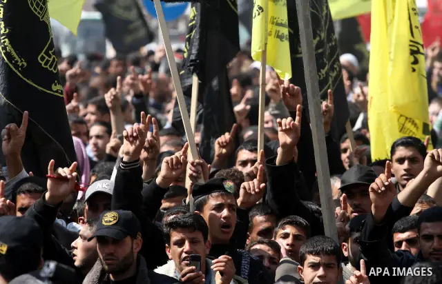 Palestinian Islamic Jihad supporters take part in a rally in support of Hana Shalabi and calling for the release of Palestinian prisoners held in Israeli jails, in Gaza City March 23, 2012. The deteriorating health of Sh...