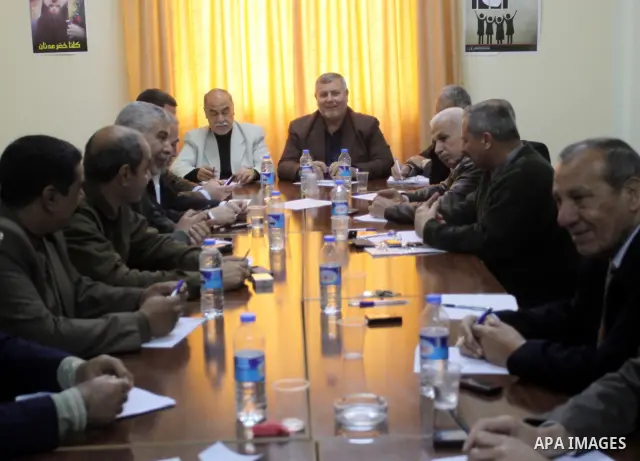 Palestinian factions leaders attend a meeting to discuss power crisis in Gaza city on March 25,2012. Photo by Mohammed Asad