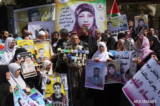 Palestinian official, delivers speech during a press conference weekly protest calling for release the prisoners ,in Gaza City on March 26, 2012. Photo by Mohammed Asad