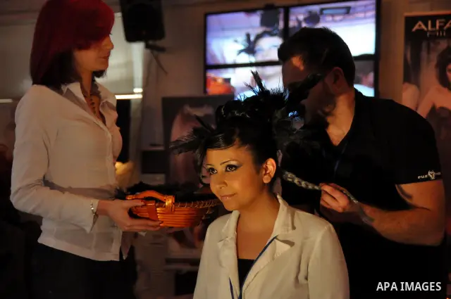 Israeli Arab models line up on stage during a beauty pageant and hair styling contest in the West Bank city of Tulkarem, Monday, March 26, 2012. Over 100 Palestinians, Israeli Arabs and Golan residents took part in the p...