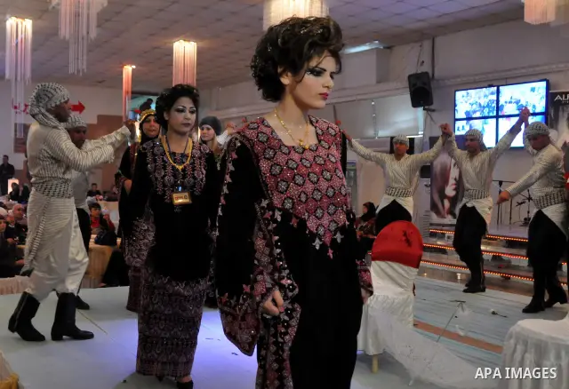 Israeli Arab models line up on stage during a beauty pageant and hair styling contest in the West Bank city of Tulkarem, Monday, March 26, 2012. Over 100 Palestinians, Israeli Arabs and Golan residents took part in the p...