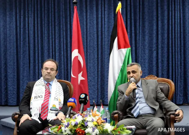 Palestinian Foreign Affairs Minister in Gaza Strip, Mohammed Awad receives President of the Teka Institution in Gaza City on Mar. 27,2012. Photo by Ahmed Shaat
