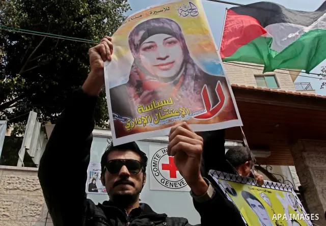Palestinians take part in a rally in Gaza City, calling for the release of Palestinian prisoners from Israeli jails March 28, 2012. Photo by Ashraf Amra