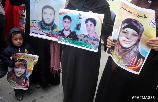 Palestinians take part in a rally in Gaza City, calling for the release of Palestinian prisoners from Israeli jails March 28, 2012. Photo by Ashraf Amra