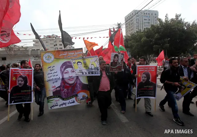 Palestinians take part in a rally in Gaza City, calling for the release of Palestinian prisoners from Israeli jails March 28, 2012. Photo by Ashraf Amra