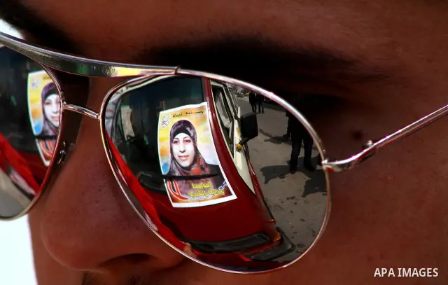 Palestinians take part in a rally in Gaza City, calling for the release of Palestinian prisoners from Israeli jails March 28, 2012. Photo by Ashraf Amra