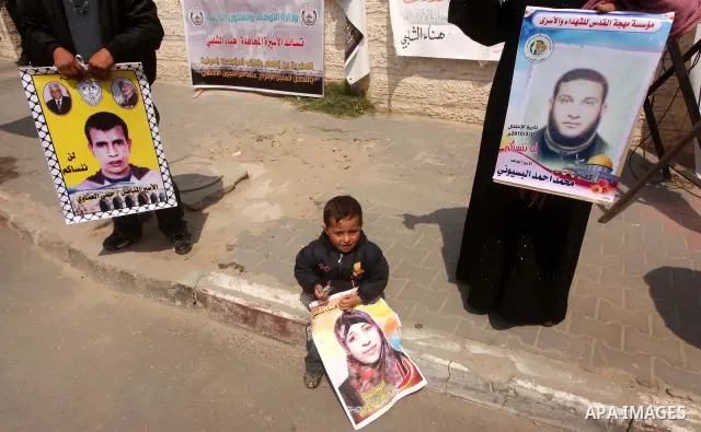 A Palestinian boy attends a rally in Gaza City, calling for the release of Palestinian prisoners from Israeli jails March 28, 2012. Photo by Ashraf Amra