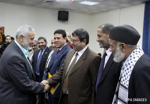 Palestinian Prime Minister in Gaza Strip, Ismail Haniyeh, receives members of Egyptian parliamentary delegation in Gaza City, on March 29, 2012. The delegation is on a solidarity visit with the Palestinian people to the...