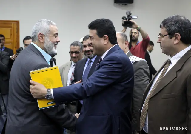 Palestinian Prime Minister in Gaza Strip, Ismail Haniyeh, receives members of Egyptian parliamentary delegation in Gaza City, on March 29, 2012. The delegation is on a solidarity visit with the Palestinian people to the...