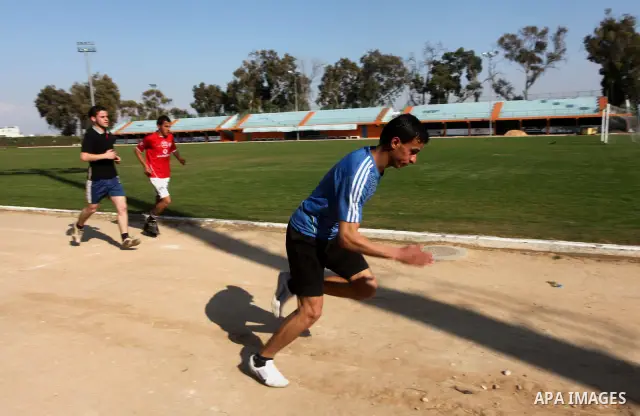 Palestinian runner Bahaa al-Farra, who has been selected to represent Palestine at the London Olympics in July - August 2012 during training at the al-Yarmouk soccer stadium in Gaza City on March 29, 2012. Farra will be...