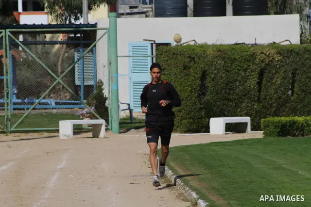 Palestinian runner Bahaa al-Farra, who has been selected to represent Palestine at the London Olympics in July - August 2012 during training at the al-Yarmouk soccer stadium in Gaza City on March 29, 2012. Farra will be...