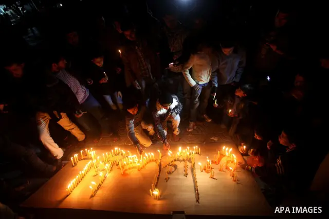 Palestinian children hold candles during a protest calling for power in Gaza City, on March 29, 2012. The Red Cross said on March, 29 it would ship emergency supplies of fuel to help alleviate the Gaza Strip's worsening...