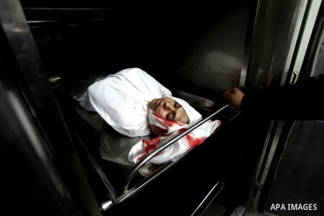 Palestinians mourner for Mahmud Zakut during his funeral in Beit Lahia, north of the Gaza strip, on March 30, 2012. Israeli troops shot dead 20-year-old Zakut in Beit Hanun near the border fence with Israel, north of Gaz...