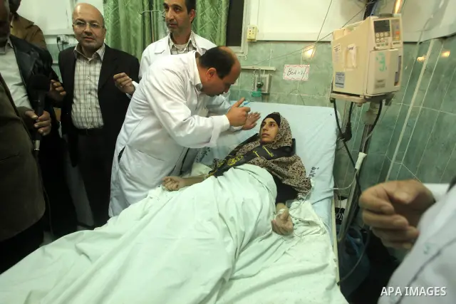 Hana Shalabi arrives to al-Shifa hospital in Gaza City, Sunday, April 1, 2012. Israel has released Shalabi, a 30-year-old Islamic Jihad supporter from the West Bank, and sent her to the Gaza Strip as part of a compromise...
