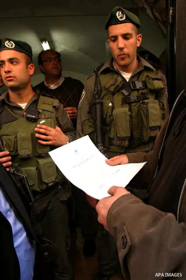 Israelis police stand guard in front of network "Hona Al Quds" in Jerusalem's Old City on Apr. 02, 2012 . Photo by Mahfouz Abu Turk