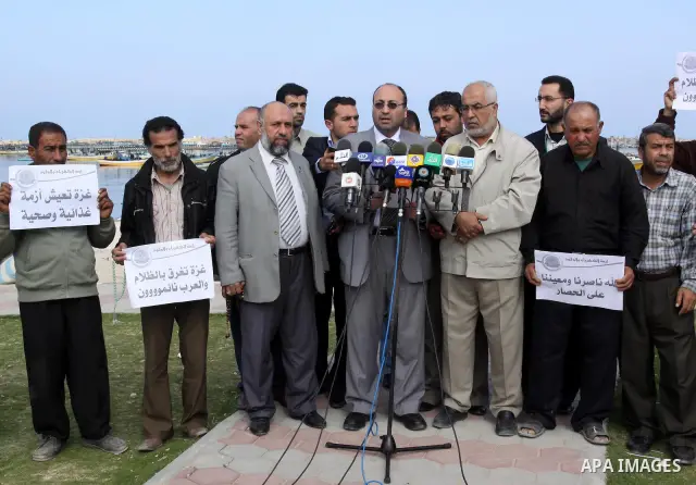 Palestinian official of the Ministry of Agriculture delivers speech during a press conference about the impact of the fuel crisis on the fisherman, in Gaza City, on Apr. 03, 2012. Photo by Mohammed Asad