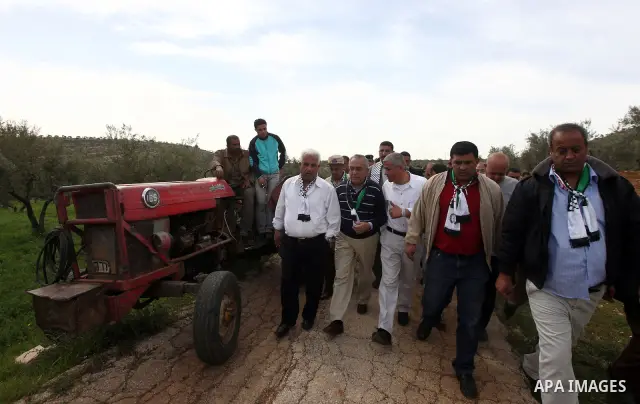 Palestinian Prime Minister Salam Fayyad arrives to pay a visit to support Palestinian farmers in the Yanun village near the West Bank City of Nablus, 05 April 2012. The village was temporarily abandoned by its residents...